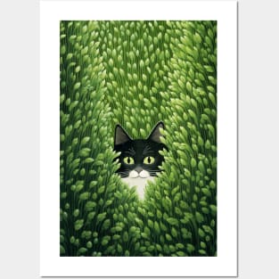 Cat in the green grass Posters and Art